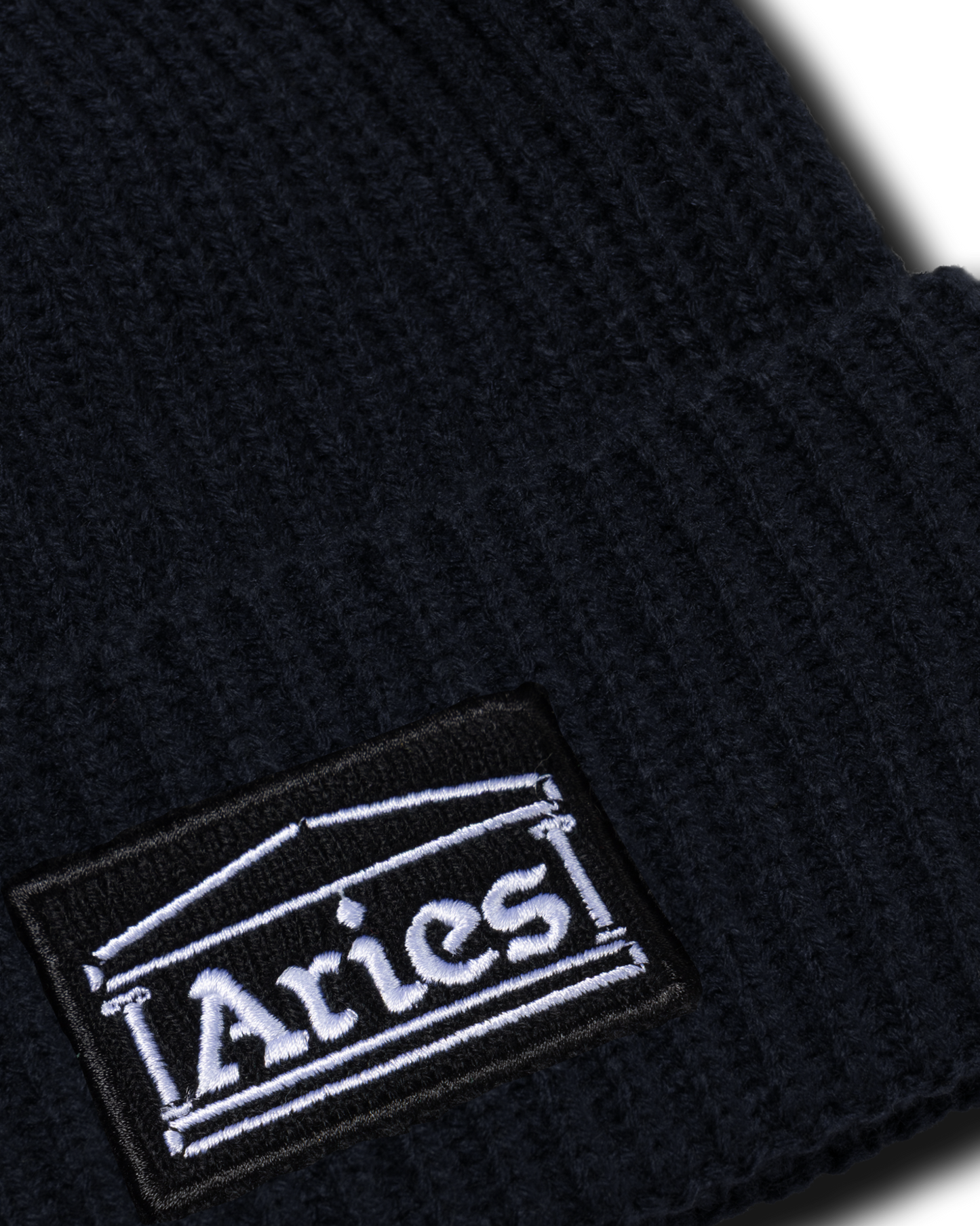 Temple Patch Rib Knit Beanie